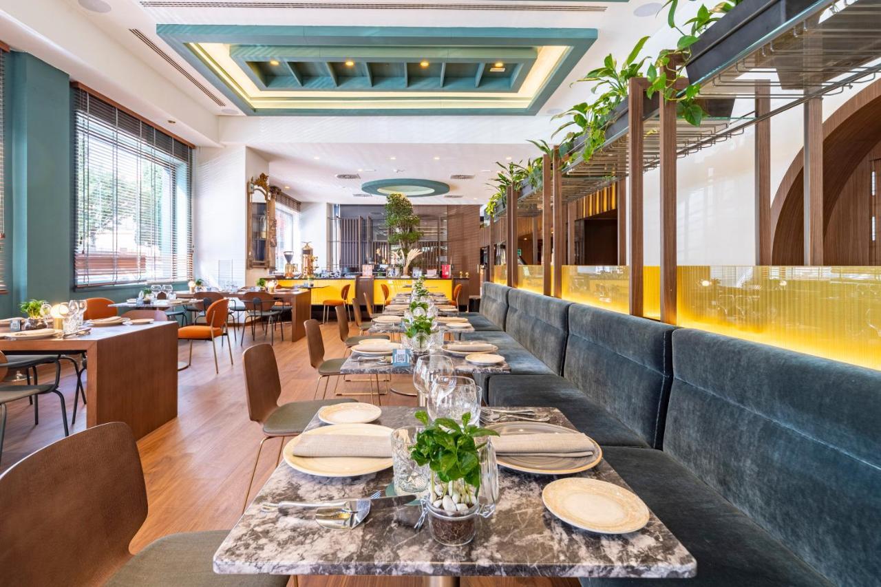 Melia Milano Hotel Exterior photo Restaurant interior